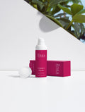Vitamin C Serum for glowing skin with packaging on white background